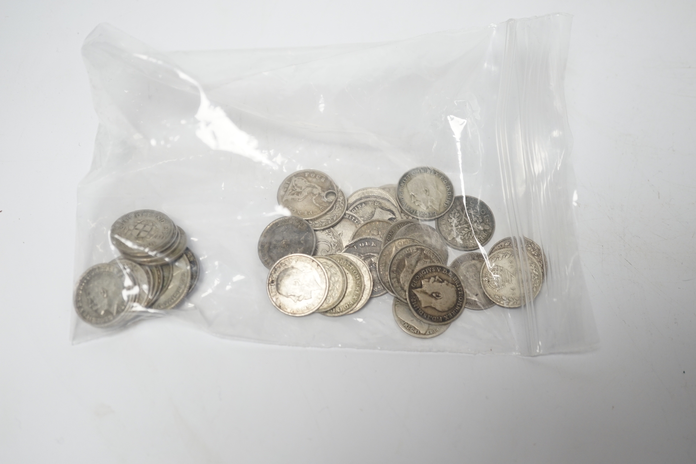 Fifty-two late 19th and early 20th century 3d coins